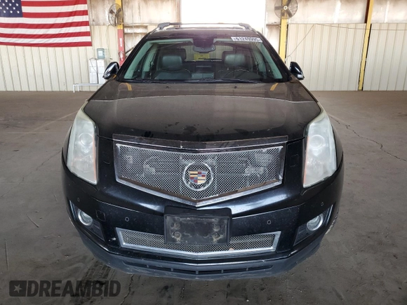 2012 Cadillac SRX Premium Collection z VIN 3GYFNFE30CS599863, wystawiony jako Copart lot #61249995 z przebiegiem 144 740 mil mil oraz Czysty tytuł • Clean title. Historia ofert i sprzedaży dostępna na DreamBid. Obrazek 5.