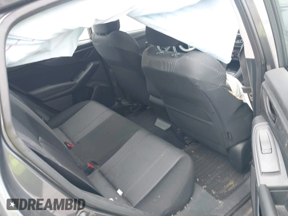 2018 Subaru Impreza Premium z VIN 4S3GTAD61J3703780, wystawiony jako IAAI lot #42081604 z przebiegiem 79 757 mil mil oraz . Historia ofert i sprzedaży dostępna na DreamBid. Obrazek 8.
