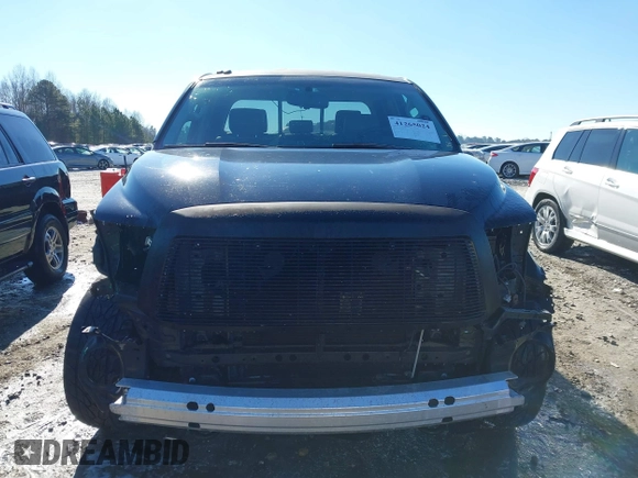 2012 Toyota Tundra z VIN 5TFUW5F14CX217964, wystawiony jako IAAI lot #41265024 z przebiegiem 144 426 mil mil oraz . Historia ofert i sprzedaży dostępna na DreamBid. Obrazek 13.