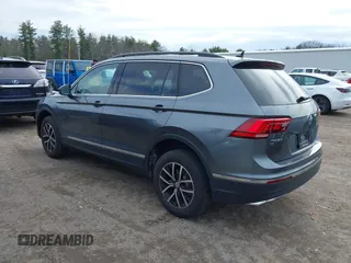 2021 Volkswagen Tiguan SE with VIN 3VV2B7AX6MM054611, listed as a IAAI auction lot 41978323 with 23,029 mi miles and . Bid and sale history available at DreamBid. Image 3.