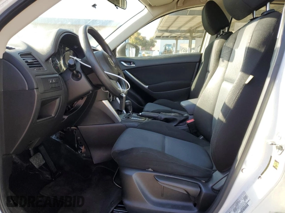 2013 Mazda CX-5 Sport with VIN JM3KE2BE7D0148951, listed as a Copart auction lot 57782115 with 65,677 mi miles and Salvage title. Bid and sale history available at DreamBid. Image 7.