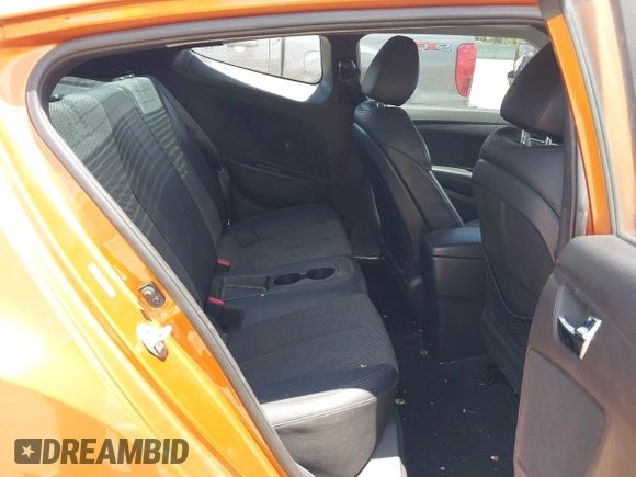 2013 Hyundai Veloster w/Black Int with VIN KMHTC6AD0DU147017, listed as a IAAI auction lot 42707858 with 115,130 mi miles and . Bid and sale history available at DreamBid. Image 8.
