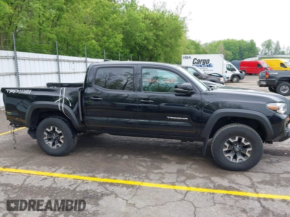 2021 Toyota Tacoma SR with VIN 3TMCZ5AN0MM417261, listed as a IAAI auction lot 42240693 with 38,625 mi miles and . Bid and sale history available at DreamBid. Image 14.