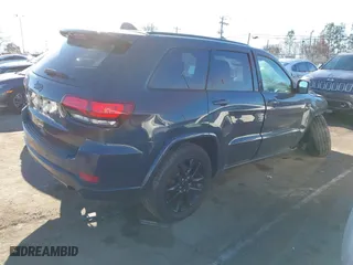 2018 Jeep Grand Cherokee Laredo E with VIN 1C4RJFAGXJC147400, listed as a IAAI auction lot 41358662 with 97,184 mi miles. Bid and sale history available at carsss.com. Image 4.