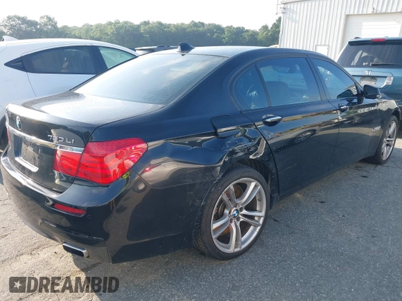 2011 BMW 7 Series 750Li xDrive with VIN WBAKC8C55BC434418, listed as a IAAI auction lot 42695385 with 93,427 mi miles and . Bid and sale history available at DreamBid. Image 6.