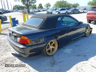 2004 BMW 3 Series 325Ci with VIN WBABW33454PG97847, listed as a IAAI auction lot 41903694 with 127,612 mi miles. Bid and sale history available at carsss.com. Image 4.