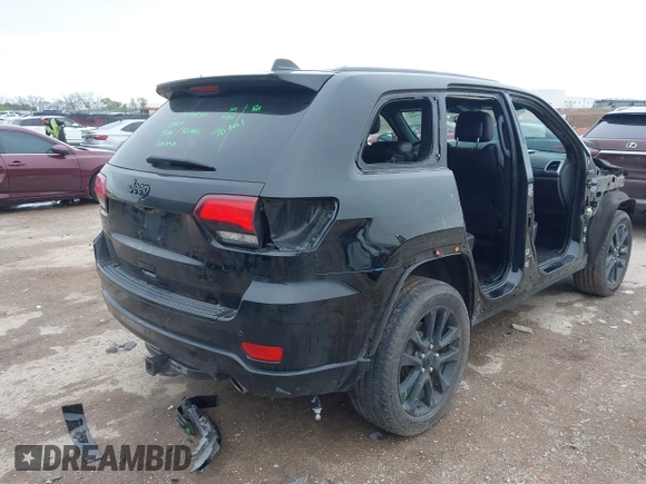 2018 Jeep Grand Cherokee Laredo E with VIN 1C4RJFAG5JC280033, listed as a IAAI auction lot 41953744 with 69,269 mi miles and . Bid and sale history available at DreamBid. Image 4.