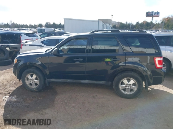 2011 Ford Escape XLT with VIN 1FMCU9DG3BKB95799, listed as a IAAI auction lot 41058817 with Not provided miles and . Bid and sale history available at DreamBid. Image 15.