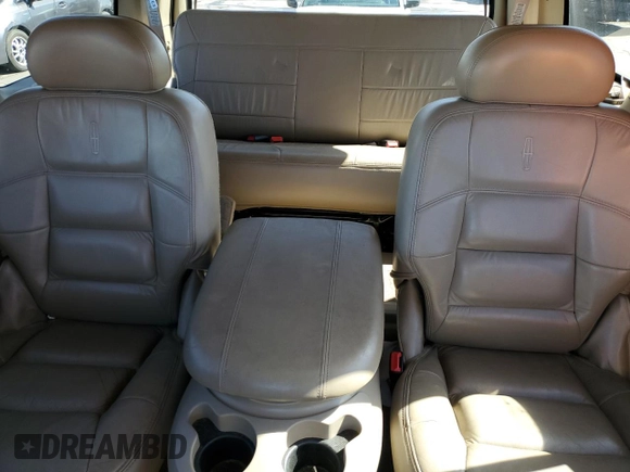 2002 Lincoln Navigator z VIN 5LMFU28R42LJ11223, wystawiony jako Copart lot #57127995 z przebiegiem 170 321 mil mil oraz Szkoda całkowita • Salvage title. Historia ofert i sprzedaży dostępna na DreamBid. Obrazek 10.
