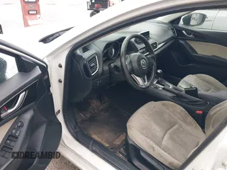 2014 Mazda 3 i Touring z VIN JM1BM1L73E1101014, wystawiony jako IAAI lot #42472127 z przebiegiem 121 426 mil mil oraz . Historia ofert i sprzedaży dostępna na DreamBid. Obrazek 17.