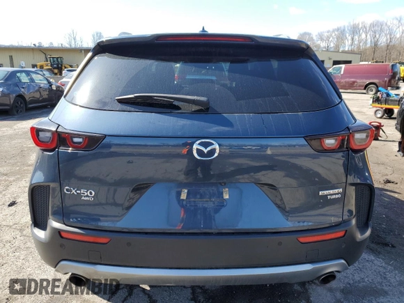 2023 Mazda CX-50 Premium Plus with VIN 7MMVABEY1PN125180, listed as a Copart auction lot 52075375 with 32,483 mi miles and Salvage Title. Bid and sale history available at DreamBid. Image 6.