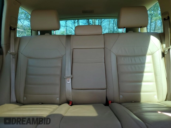2010 Volkswagen Touareg VR6 with VIN WVGBF7A97AD003738, listed as a Copart auction lot 50394915 with 126,591 mi miles and Salvage Title. Bid and sale history available at DreamBid. Image 10.