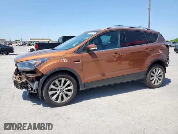 2017 Ford Escape Titanium with VIN 1FMCU0JD3HUA31410, listed as a Copart auction lot 52729025 with 68,256 mi miles and Salvage Title. Bid and sale history available at DreamBid. Image 1.