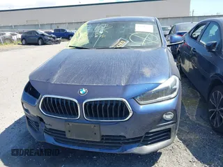 2018 BMW X2 sDrive28i z VIN WBXYJ3C31JEP76135, wystawiony jako IAAI lot #42136753 z przebiegiem 21 377 mil mil oraz . Historia ofert i sprzedaży dostępna na DreamBid. Obrazek 13.