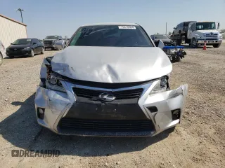2014 Lexus CT 200h z VIN JTHKD5BH9E2186144, wystawiony jako Copart lot #75470904 z przebiegiem 125 062 mil mil oraz Szkody całkowita. Historia ofert i sprzedaży dostępna na DreamBid. Obrazek 5.