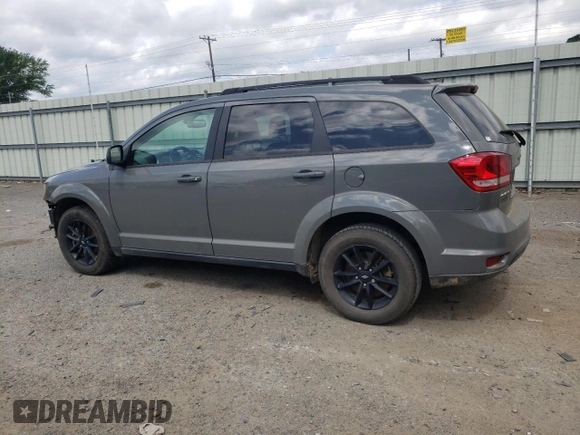 2019 Dodge Journey SE with VIN 3C4PDCBB0KT875474, listed as a Copart auction lot 52987395 with 76,816 mi miles and Salvage Title. Bid and sale history available at DreamBid. Image 2.