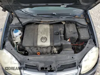 2009 Volkswagen Jetta SE z VIN 3VWRM71K49M055000, wystawiony jako Copart lot #54450045 z przebiegiem 163 451 mil mil oraz Szkoda całkowita • Salvage title. Historia ofert i sprzedaży dostępna na DreamBid. Obrazek 11.
