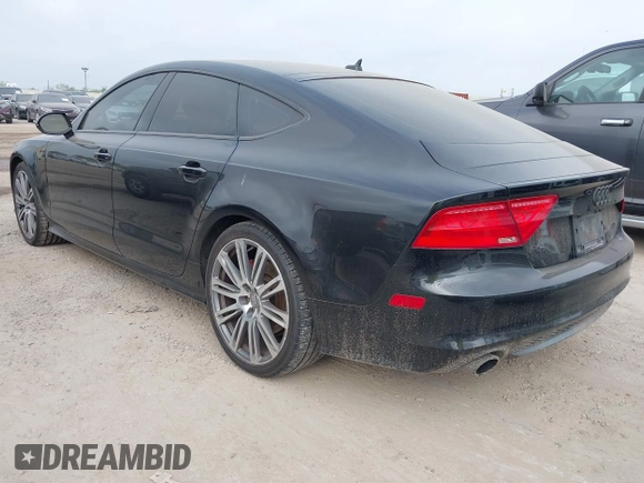 2013 Audi A7 Prestige with VIN WAU2GAFCXDN054133, listed as a IAAI auction lot 41924265 with 170,498 mi miles and . Bid and sale history available at DreamBid. Image 3.