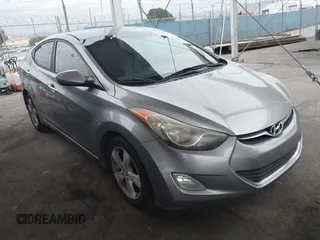 2013 Hyundai Elantra GLS z VIN KMHDH4AE7DU737895, wystawiony jako IAAI lot #42058428 z przebiegiem 140 124 mil mil oraz . Historia ofert i sprzedaży dostępna na DreamBid. Obrazek 1.