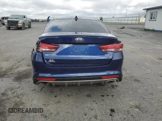 2018 Kia Optima SX with VIN 5XXGV4L25JG230508, listed as a Copart auction lot 56423135 with 100,575 mi miles and Salvage title. Bid and sale history available at DreamBid. Image 6.
