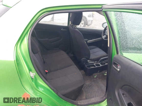 2012 Mazda 2 Sport z VIN JM1DE1KY8C0138921, wystawiony jako IAAI lot #42386937 z przebiegiem 263 981 mil mil oraz . Historia ofert i sprzedaży dostępna na DreamBid. Obrazek 8.