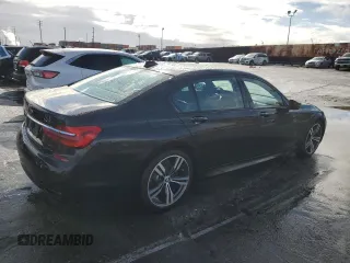 2017 BMW 7 Series 740i with VIN WBA7E2C59HG739788, listed as a Copart auction lot 48073105 with 36,274 mi miles and Salvage Title. Bid and sale history available at carsss.com. Image 3.