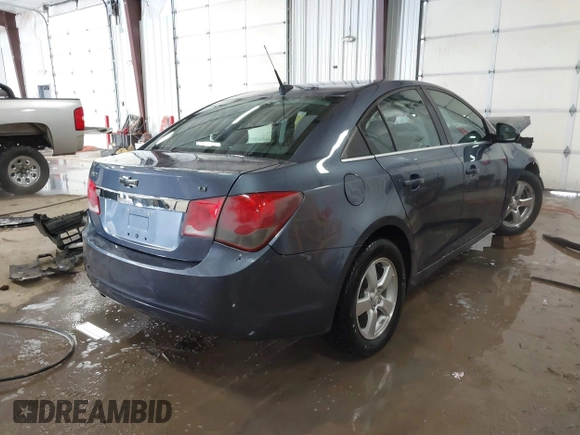 2014 Chevrolet Cruze 1LT with VIN 1G1PC5SB0E7112323, listed as a IAAI auction lot 41571759 with 191,477 mi miles and . Bid and sale history available at DreamBid. Image 4.