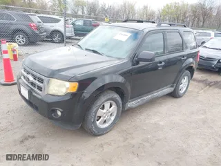 2012 Ford Escape XLT with VIN 1FMCU0D72CKC02397, listed as a IAAI auction lot 42042886 with 261,627 mi miles. Bid and sale history available at carsss.com. Image 2.