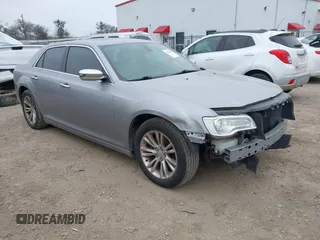 2015 Chrysler 300 300C with VIN 2C3CCAEG0FH779540, listed as a IAAI auction lot 41542982 with 211,348 mi miles. Bid and sale history available at carsss.com. Image 1.