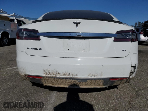 2014 Tesla Model S 60 with VIN 5YJSA1H15EFP53881, listed as a Copart auction lot 45136545 with 111,143 mi miles and Salvage Title. Bid and sale history available at DreamBid. Image 6.