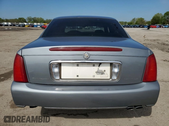 2001 Cadillac DeVille z VIN 1G6KD54Y41U273417, wystawiony jako Copart lot #55604295 z przebiegiem Nie podano mil oraz Szkoda całkowita • Salvage title. Historia ofert i sprzedaży dostępna na DreamBid. Obrazek 6.