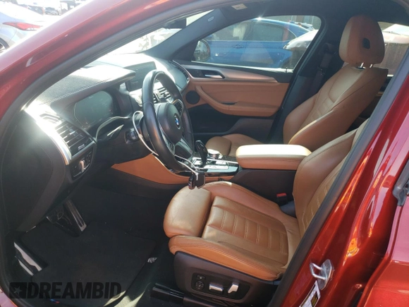 2021 BMW X4 M40i with VIN 5UX2V5C0XM9E78318, listed as a Copart auction lot 57834645 with 67,277 mi miles and Salvage title. Bid and sale history available at DreamBid. Image 7.