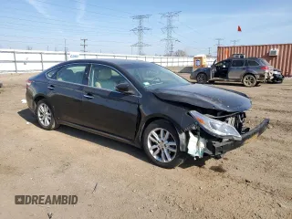 2013 Toyota Avalon XLE with VIN 4T1BK1EB1DU055523, listed as a Copart auction lot 52527445 with 139,107 mi miles and Salvage Title. Bid and sale history available at DreamBid. Image 4.