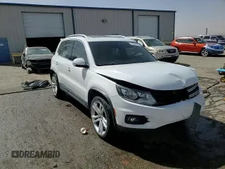 2012 Volkswagen Tiguan SE with VIN WVGAV7AX1CW530016, listed as a Copart auction lot 48551935 with 102,455 mi miles and Salvage Title. Bid and sale history available at DreamBid. Image 14.