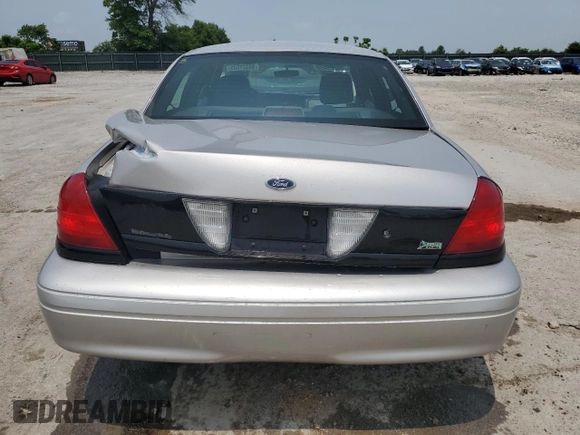 2010 Ford Police Interceptor with VIN 2FABP7BV2AX126536, listed as a Copart auction lot 60327535 with 138,759 mi miles and Salvage title. Bid and sale history available at DreamBid. Image 6.