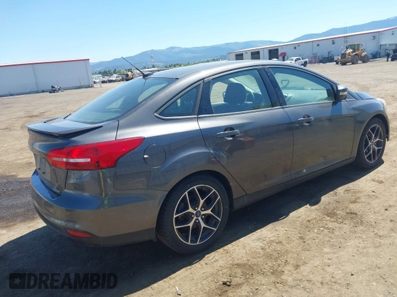 2015 Ford Focus SE with VIN 1FADP3FE4FL314250, listed as a IAAI auction lot 42194048 with 130,235 mi miles and . Bid and sale history available at carsss.com. Image 4.