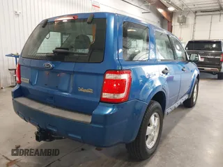 2011 Ford Escape XLS z VIN 1FMCU9C72BKB65226, wystawiony jako IAAI lot #42694360 z przebiegiem 169 375 mil mil oraz . Historia ofert i sprzedaży dostępna na DreamBid. Obrazek 4.