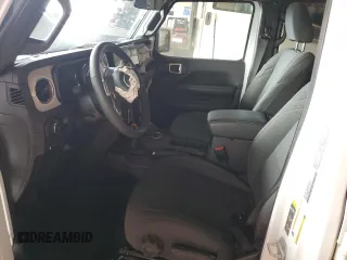 2024 Jeep Wrangler Sahara with VIN 1C4RJXP67RW223380, listed as a Copart auction lot 52192095 with 18,326 mi miles and Salvage Title. Bid and sale history available at DreamBid. Image 7.