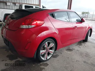 2014 Hyundai Veloster z VIN KMHTC6AD3EU201508, wystawiony jako IAAI lot #42353066 z przebiegiem 140 032 mil mil oraz . Historia ofert i sprzedaży dostępna na DreamBid. Obrazek 4.