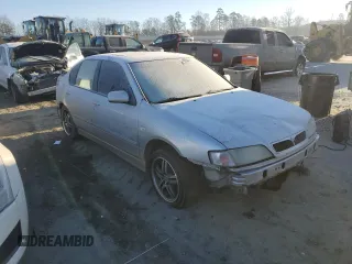 2002 Infiniti G20 Luxury with VIN JNKCP11A02T512055, listed as a Copart auction lot 42599045 with 160,649 mi miles and Salvage Title. Bid and sale history available at DreamBid. Image 4.