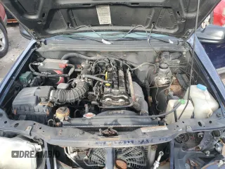 2000 Suzuki Vitara JX z VIN 2S3TD52V6Y6111082, wystawiony jako Copart lot #82444534 z przebiegiem 271 122 mil mil oraz Nie do naprawy. Historia ofert i sprzedaży dostępna na DreamBid. Obrazek 11.