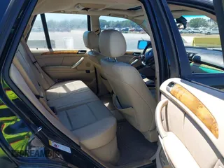 2002 BMW X5 3.0i with VIN 5UXFA53502LV70219, listed as a IAAI auction lot 41825148 with 0 mi miles. Bid and sale history available at carsss.com. Image 8.