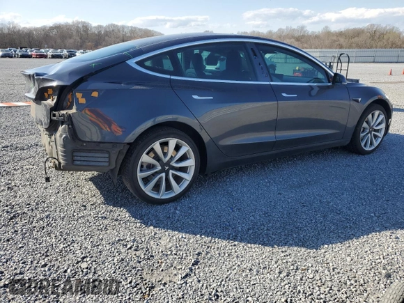 2019 Tesla Model 3 Mid Range with VIN 5YJ3E1EA5KF412702, listed as a Copart auction lot 50008895 with 134,178 mi miles and Salvage Title. Bid and sale history available at carsss.com. Image 3.