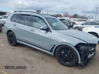 2025 BMW X7 xDrive40i with VIN 5UX23EM01S9W23566, listed as a IAAI auction lot 41490415 with 8,144 mi miles. Bid and sale history available at carsss.com. Image 1.