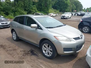 2008 Mazda CX-7 Grand Touring z VIN JM3ER29LX80190137, wystawiony jako IAAI lot #42502254 z przebiegiem 129 453 mil mil oraz . Historia ofert i sprzedaży dostępna na DreamBid. Obrazek 1.