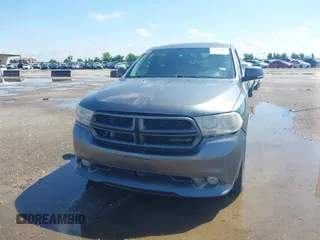 2013 Dodge Durango R/T z VIN 1C4SDHCT7DC564802, wystawiony jako IAAI lot #42348957 z przebiegiem 178 354 mil mil oraz . Historia ofert i sprzedaży dostępna na DreamBid. Obrazek 6.
