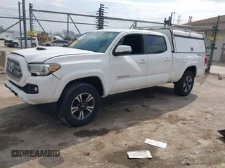 2017 Toyota Tacoma SR5 with VIN 3TMDZ5BN4HM018877, listed as a IAAI auction lot 41898666 with 198,848 mi miles. Bid and sale history available at carsss.com. Image 2.
