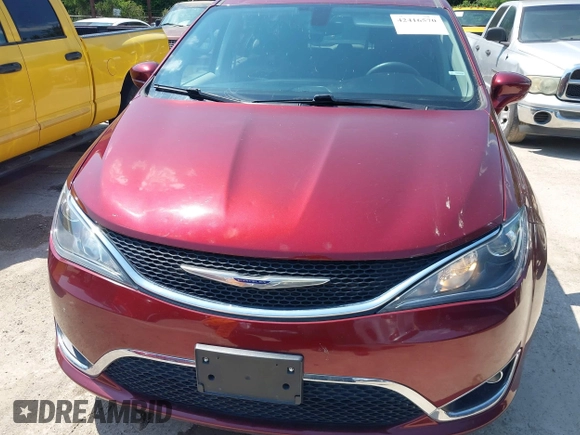 2019 Chrysler Pacifica Touring Plus z VIN 2C4RC1FGXKR706264, wystawiony jako IAAI lot #42416570 z przebiegiem 86 897 mil mil oraz . Historia ofert i sprzedaży dostępna na DreamBid. Obrazek 12.