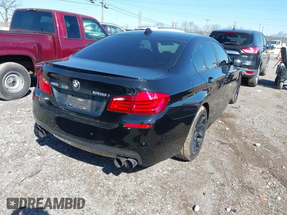 2013 BMW 5 Series 550i xDrive with VIN WBAFU9C54DDY70243, listed as a IAAI auction lot 41812862 with 85,758 mi miles and . Bid and sale history available at carsss.com. Image 4.