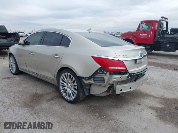 2014 Buick LaCrosse Premium II with VIN 1G4GF5G38EF253691, listed as a IAAI auction lot 41411307 with 141,863 mi miles and . Bid and sale history available at DreamBid. Image 3.